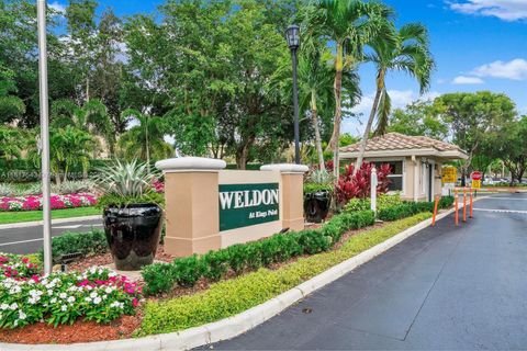 Photo of 9575 Weldon Cir #C413, Tamarac, FL 33321 (MLS # A11817543)