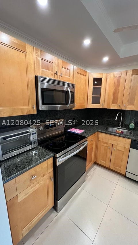 Photo of 20500 W Country Club Dr #204, Aventura, FL 33180 (MLS # A12080425)