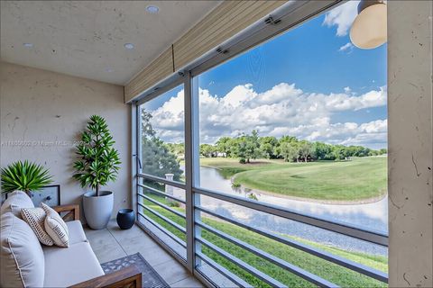 Photo of 8205 NW 61st St #B209, Tamarac, FL 33321 (MLS # A11800602)