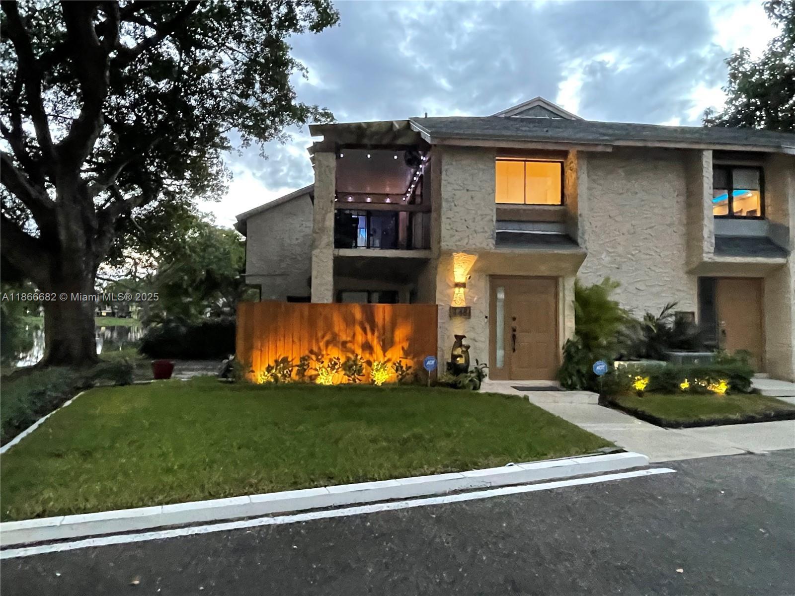 Completely renovated 3BR/2BA corner condo with lake views. This spacious 2nd-floor unit features marble floors, granite counters, stainless appliances, impact windows, security system, and enclosed balcony. Open layout with modern finishes plus updated AC, water heater, washer/dryer, and two assigned parking spaces. Community amenities include pool and tennis. Ideally located near highways, shopping, dining, and entertainment, offering comfort, style, and convenience all in one. Water included.