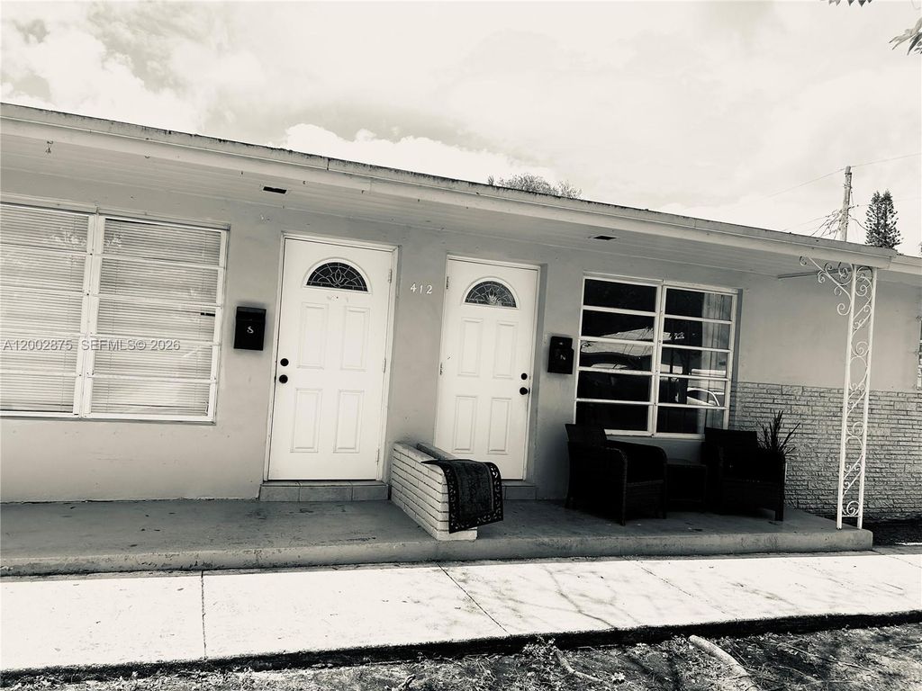 Photo of 412 SW 10th St #1-2, Hallandale Beach, FL 33009 (MLS # A12002875)