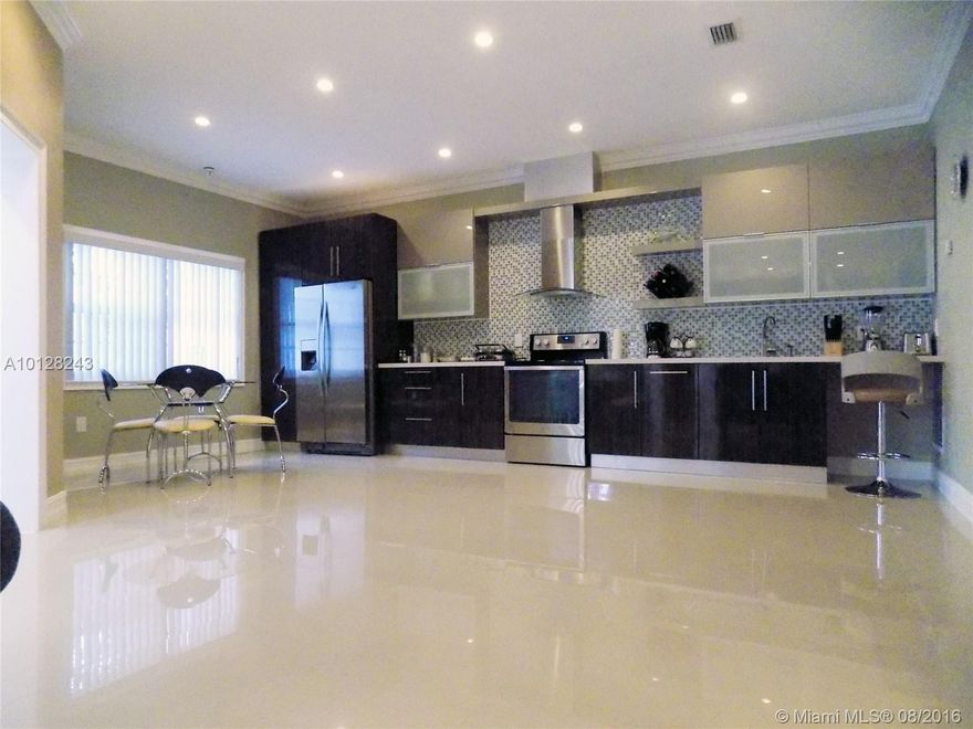 NEWLY REMODELED PROPERTY. WELL OVER $100K IN RENOVATIONS. THE ENTIRE MODERNIZATION PROJECT WAS DONE TO TASTE, AND WITH THE HIGHEST QUALITY MATERIALS AVAILABLE. NEW ELECTRICAL WIRING, PLUMBING, A/C, IMPACT WINDOWS AND DOORS, FLOORS, KITCHEN, BATHROOMS, AND  MANY MORE UPGRADES. BEAUTIFUL HOME READY TO MOVE-IN, AND ENJOYED. TAKE ADVANTAGE OF A LIKE-NEW HOUSE.