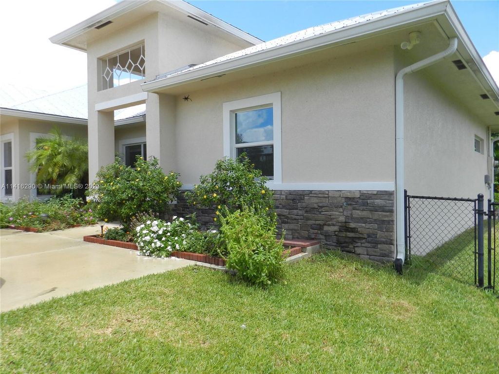 Photo of 104 Springhill Dr, Jensen Beach, FL 34957 (MLS # A11416290)