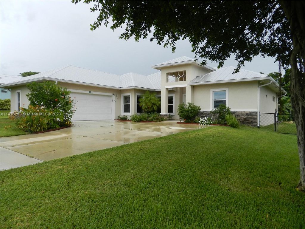 Photo of 104 Springhill Dr, Jensen Beach, FL 34957 (MLS # A11416290)