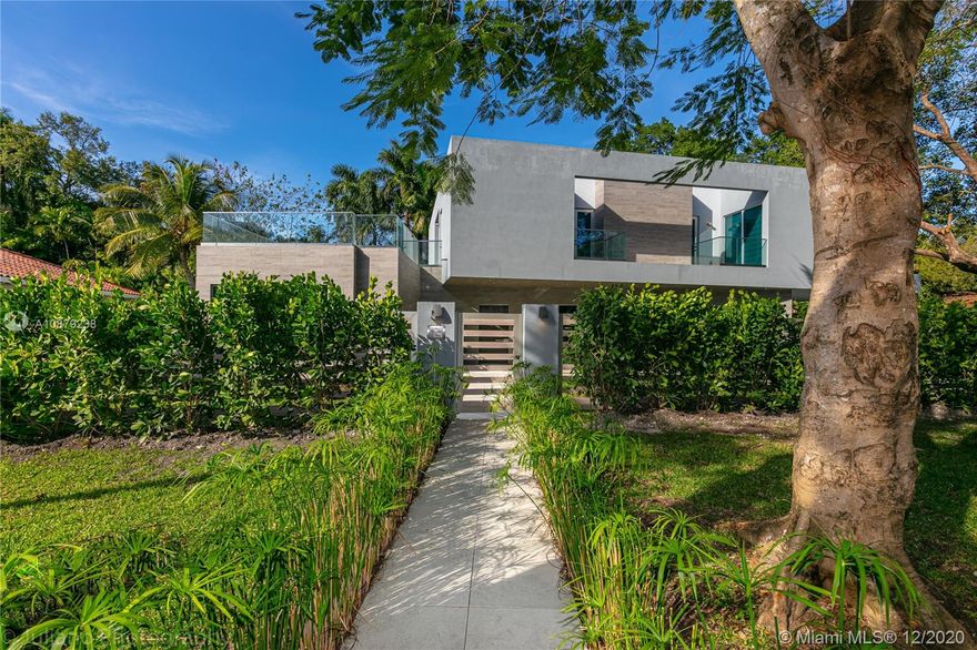 This 5,600sqft home presents a contemporary style that combines the qualities of luxury and functionality.
Located in South Coconut Grove and sitting on a 11,000 SqFt lot, this fully automated home is complemented
by state of the art technology, prime quality materials, panoramic sliding pocket doors and gourmet italian
kitchen amongst other prime features. Visit website for more information.