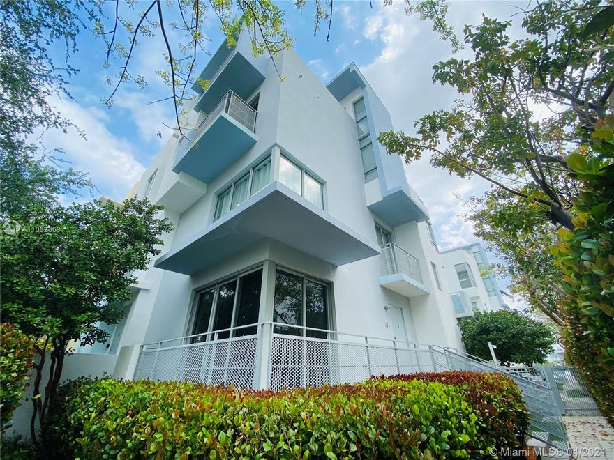 Contemporary Townhouse at Avanti boutique waterfront community located in Miami Beach. This luminous 4 story unit features 3 bedroom, 3.5 bathroom, 2 ROOF TOP TERRACES, impact windows, new granite counter tops, new wood floors, remodeled bathrooms, new A/Cs, and washer/dryer. Convenient 2 car garage. Avanti gated community offers a heated waterfront pool and community boat dock. A few steps from Normandy Shores Golf Club and across from Fairway Park that offers tennis and basketball courts, a soccer field, and children's playground. Walk to nearby supermarkets, restaurants and shops. Just a few blocks from the beach. An amazing community to live in! Yearly rental Only. AVAILABLE JUNE 1st 2021