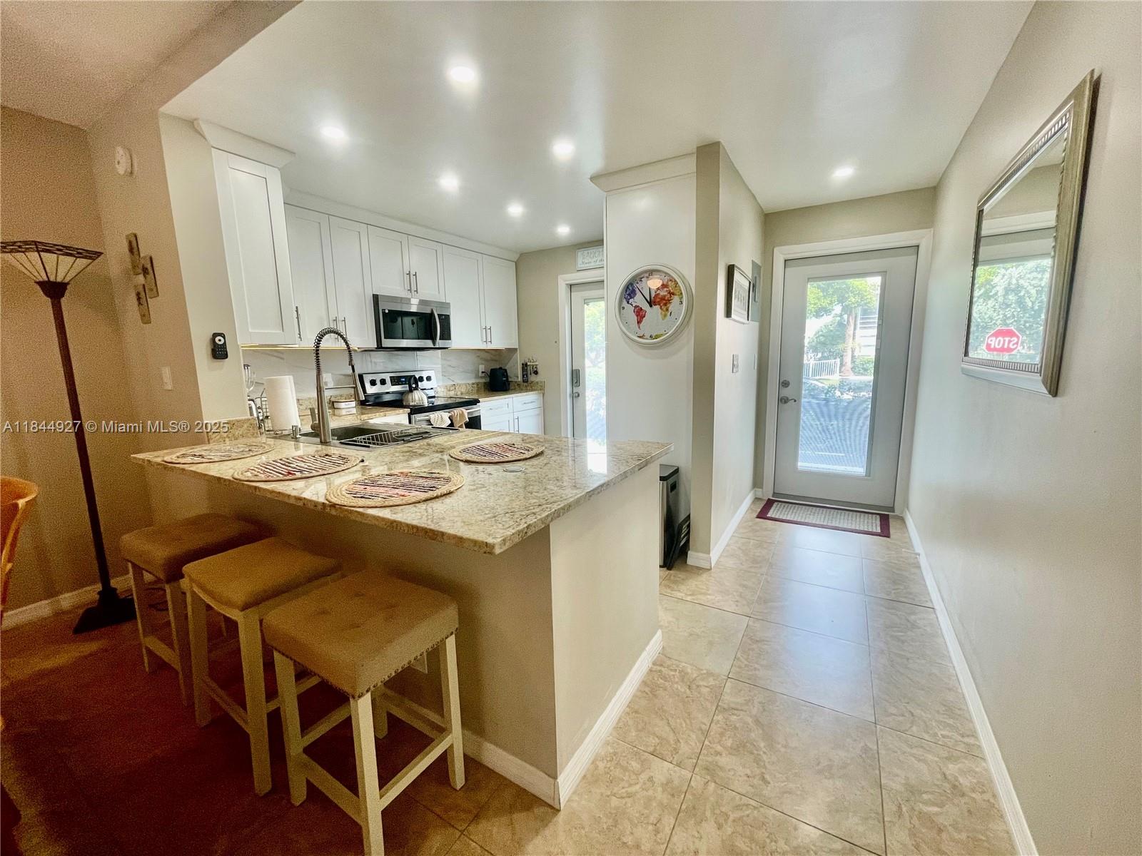 Charming 2 bed 2 bath first floor fully furnished Vacation Home ready for move-in. Conveniently located across the street from the beach in the great area of Lauderdale By The Sea with lots of restaurants & shops around, also close enough to the new up & coming Pompano Beach Pier area with parks, nightlife, restaurants & much more! 15min to Fort Lauderdale Airport. Cozy & bright, Tile floors throughout, washer & dryer in unit, open kitchen. Screened patio with pool view. Community offers heated pool, BBQ area, shuffle boards- Off-SEASON RENTAL AVAILABLE NOW, Fast approval