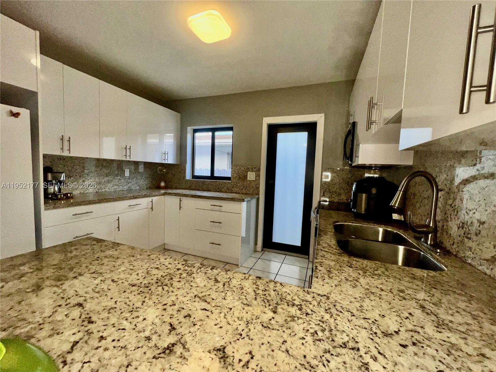 3297 SW 26th St 3299