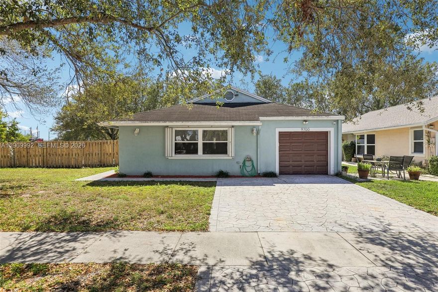 Welcome to this beautifully maintained 3-bedroom, 2-bathroom pool home in the heart of Cooper City.
Step inside to an open floor plan filled with natural light and finished in neutral tones that create a warm, inviting atmosphere. The updated bathrooms add a modern touch, while the spacious living areas flow seamlessly for both everyday living and entertaining. The kitchen features wood cabinets, stainless steel appliances and plenty of counter space.

Enjoy outdoor living in your private backyard oasis complete with a sparkling pool and screened-in patio—perfect for relaxing or hosting gatherings year-round. Accordion shutters provide added peace of mind and convenience as well as a new air conditioning unit.

Located within an A-rated school district and within walking distance to Cooper City High School and Pioneer Middle School, this home combines comfort, style, and an unbeatable location with an exceptional asking price. Don’t miss the opportunity to make this Cooper City property your own.
