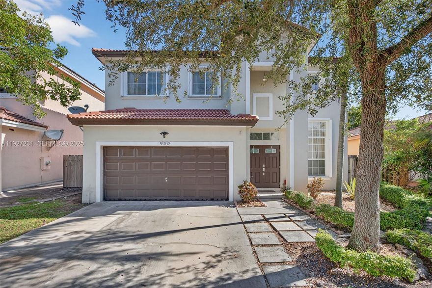 2-Story Single-Family home in Lakes by the Bay, Cutler Bay! Features a 2-car garage, hurricane shutters, double-door entry, and high ceilings. Tile flooring on the first floor and wood laminate upstairs. The kitchen offers stainless steel appliances, ample cabinetry, and overlooks the family room. The primary bedroom includes a walk-in closet and an en-suite bath with a soaking tub and separate shower. Enjoy a covered patio with a ceiling fan, perfect for entertaining. HOA includes access to the community pool and clubhouse.