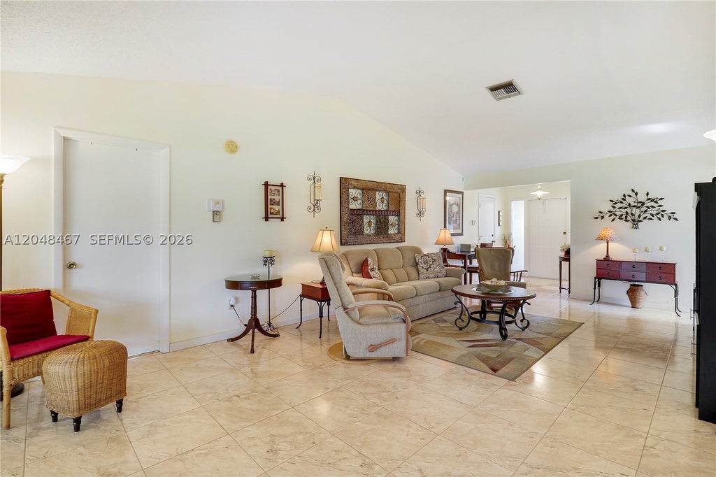 Photo of 3449 Shadow Wood Dr, Green Acres, FL 33463 (MLS # A12048467)
