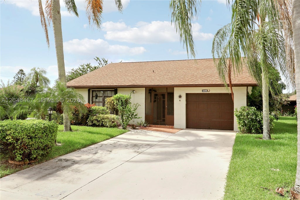Photo of 3449 Shadow Wood Dr, Green Acres, FL 33463 (MLS # A12048467)