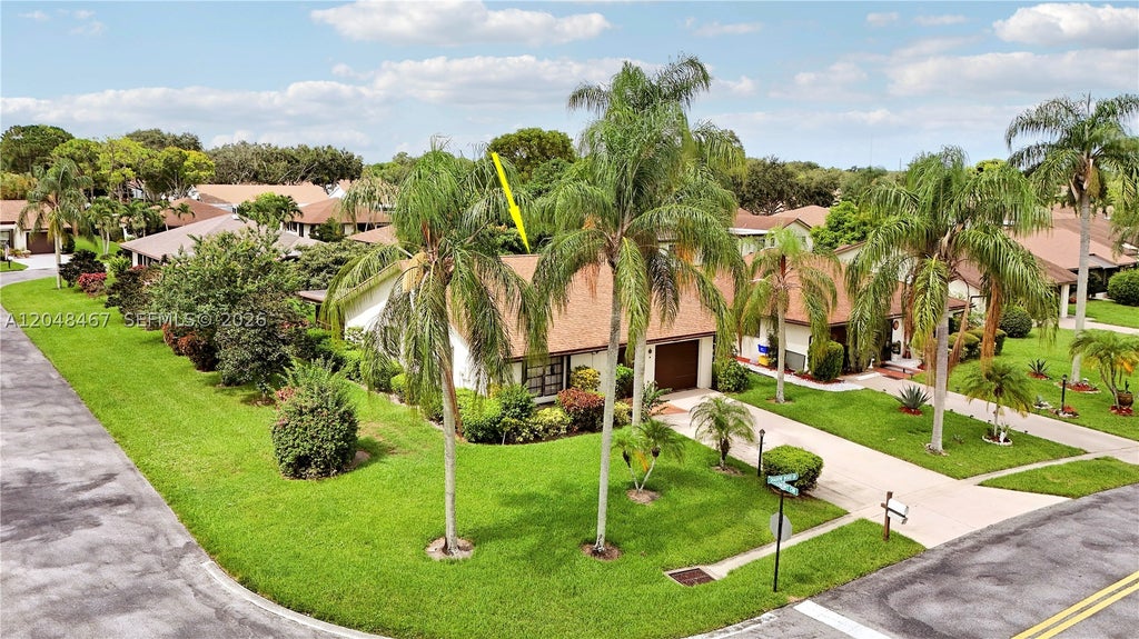 Photo of 3449 Shadow Wood Dr, Green Acres, FL 33463 (MLS # A12048467)