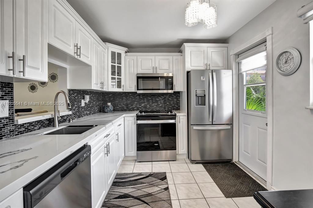 Photo of 219 NE 14th Ave #107, Hallandale Beach, FL 33009 (MLS # A11905541)