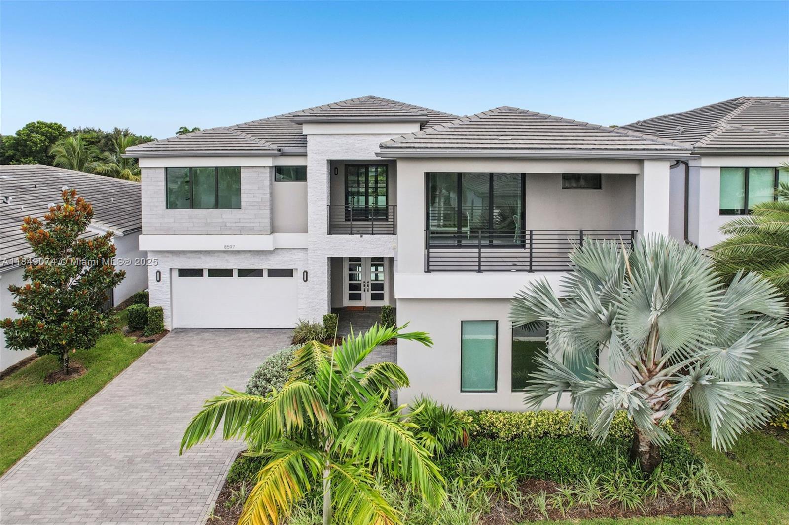 Home was purchased brand new from GL Homes in Sept 2021, and has NEVER BEEN LIVED IN!! With over $800K in total upgrades—$400K+ in builder options, and another $400K+ in post-close designer finishes. Features include a custom pool, premium lot, upgraded paver driveway/patio, built-in GE Monogram appliances, undermount gas cooktop, elegant designer chandeliers and lighting fixtures throughout the home, remote controlled motorized shades on all windows, built-in media room with wood paneling, custom “His & Hers” closets, TV wall with fireplace, stunning dining room with wood paneling wall to ceiling and mirror detail, and much more!! Luxury Community w/upscale amenities, including resort-style pools, tennis and pickleball, fitness center, and 30,000 sq.ft. clubhouse.