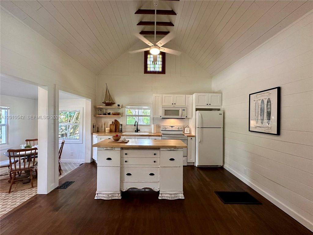 Photo of 2287 NE Patrician St, Jensen Beach, FL 34957 (MLS # A12010542)