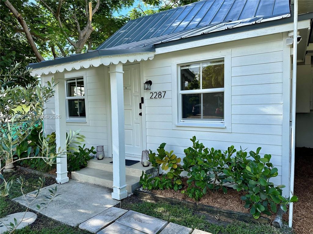 Photo of 2287 NE Patrician St, Jensen Beach, FL 34957 (MLS # A12010542)