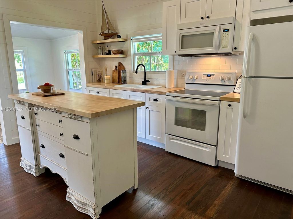 Photo of 2287 NE Patrician St, Jensen Beach, FL 34957 (MLS # A12010542)