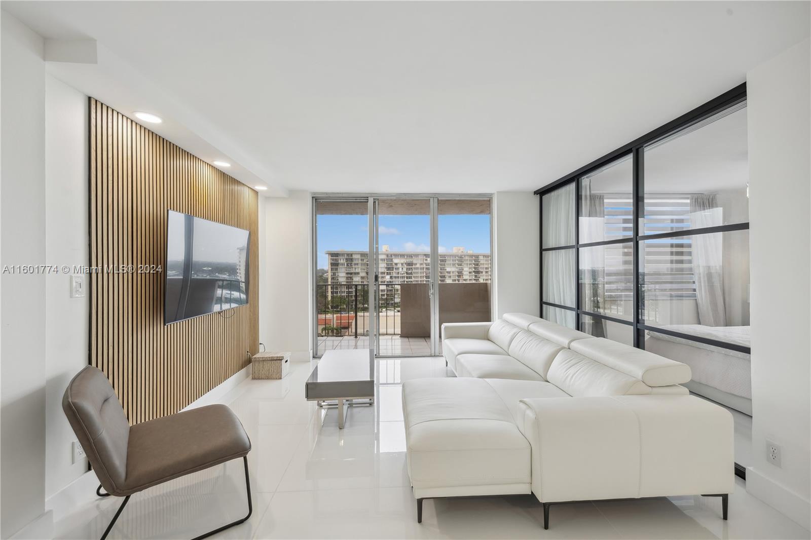This 9th floor, 2 bedroom 1.5 bath condo located in Pompano Beach, is completely permitted & renovated to a modern, contemporary unit with high-end finishes, perfect for anyone seeking a luxurious space ideal for relaxing after a long day at the beach. Situated in a corner unit, you are surrounded by breathtaking views of the ocean, intracoastal and city skyline. This condo offers the ultimate South Florida living experience. The Island Club has top-notch amenities, a 24-hour manned gate, fitness center, swimming pools, sauna, putting green and so much more. Unbeatable location with easy access to all amenities, the ocean, shopping, dinning and groceries. Schedule a viewing today and see for yourself what makes this condo so special. Passed 40 Year Inspection.