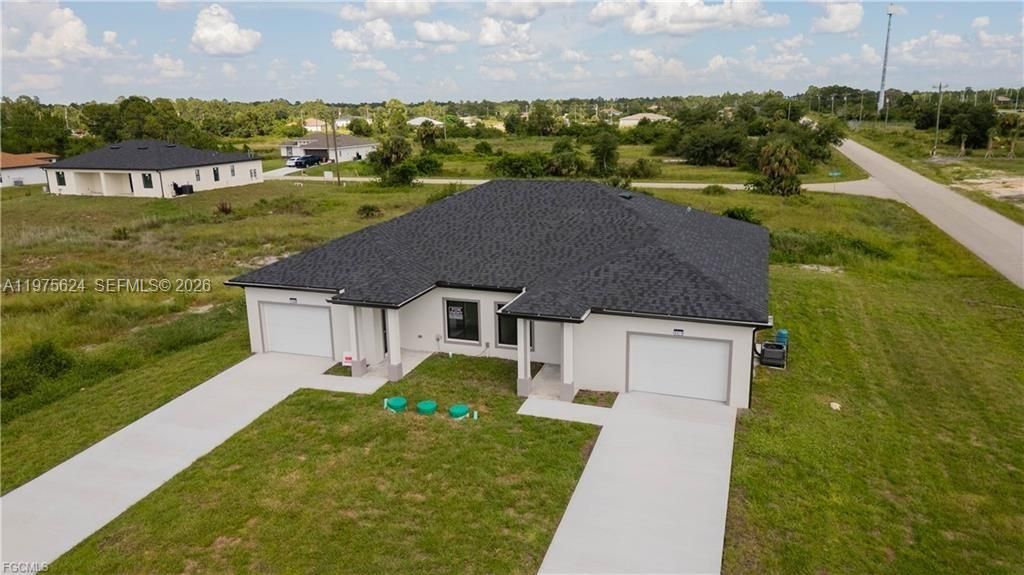 Photo of 1171 countess Ave, Lehigh Acres, FL 33974 (MLS # A11975624)