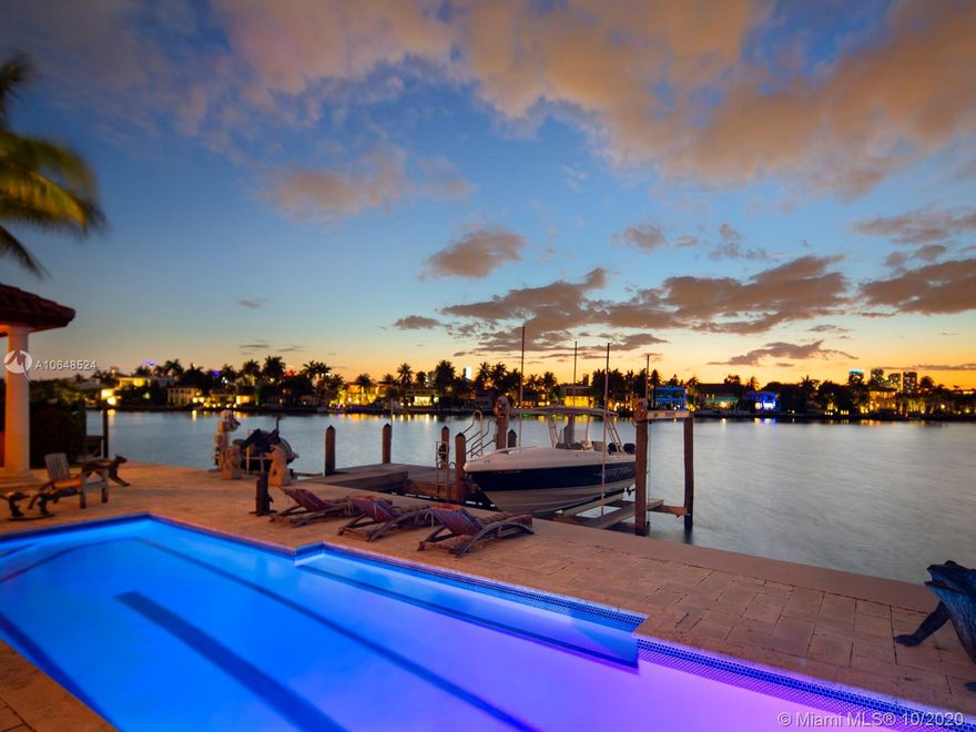 Stunning North Westerly sunset views from this beautiful Mediterranean waterfront home on the highly sought after north tip on Venetian Islands. Built in 2001 this five bedrooms and five bath home with soaring double height ceilings upon entrance, office with wood panel cabinetry, spacious master suite on second floor with wide bay water views and balcony. Located on the closest Venetian Island to Miami Beach, Rivo Alto Island, this 13,382 sqft pie shape lot with 106 ft of waterfrontage has power lines underground, sidewalks, short walking distance to Lincoln Road and Sunset Harbor retail. Private dock with lift, inground tiled lap pool, and 3.5 car garage, elevator, impact doors and windows, generator, secure gated entry, electronic shutters. Easy to show so call today to schedule a tour!