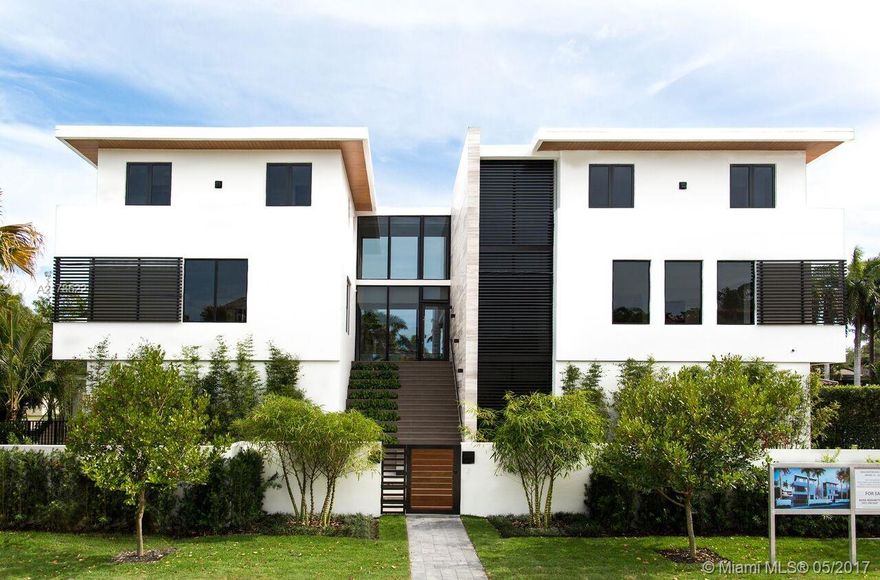 NEW CONSTRUCTION! Luxurious Modern Living Home! At more than 9,800 sq ft this 5 bedroom, 5.5 bathroom home is situated in the prestigious guard-gated Entrada Estates. With features such as a 4 car garage, pool, marine storage, private dock and separate guest house with 1 bed and 1 bath.Welcoming foyer, high-grade designer finishes, community tennis court, boat access for easy pick up/drop off, 24 hour security and much more. Minutes away from Coconut Grove and Brickell. Expected Completion December 2016