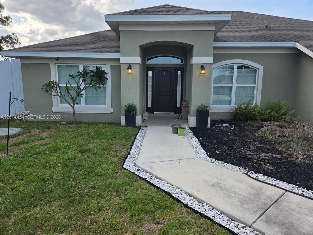 Photo of 1005 SW Bay State Rd, Port St Lucie, FL 34953 (MLS # A12011454)