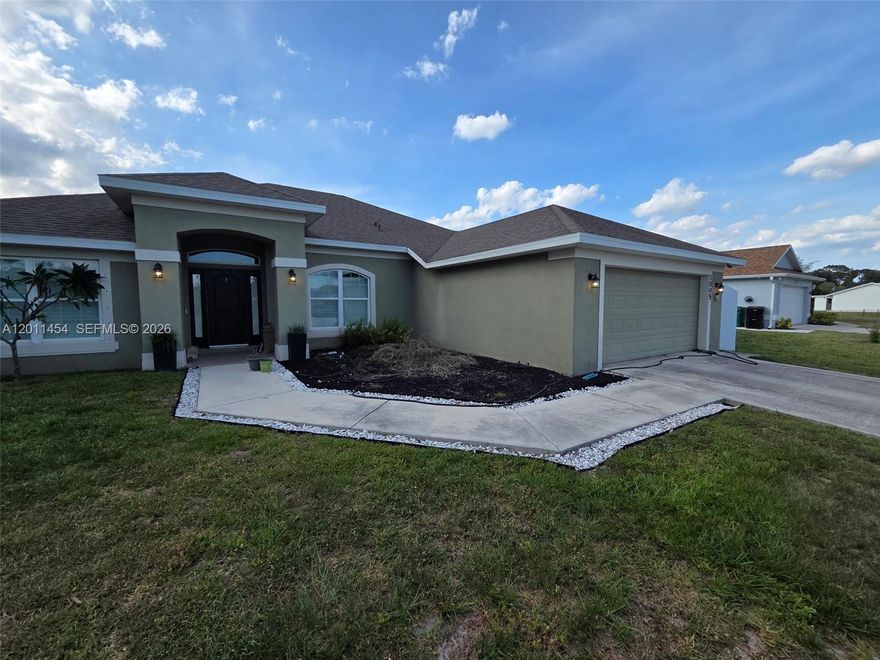 This exceptional residence, built in 2018, offers an impressive blend of elegance, comfort, and functionality. Featuring four generously sized bedrooms, three well-appointed bathrooms, and an additional den that can be utilized as a home office or flex space, the property provides ample room for both relaxation and productivity. The interior is thoughtfully designed with tile flooring throughout the main living areas, enhancing both durability and aesthetic appeal, while plantation shutters add a touch of sophistication and privacy. The modern kitchen is equipped with high-quality stainless steel appliances, making it ideal for everyday living as well as entertaining. Conveniently situated in a desirable location, the home is in close proximity to reputable schools, scenic parks, and a variety of shopping and dining options, offering both convenience and a vibrant lifestyle