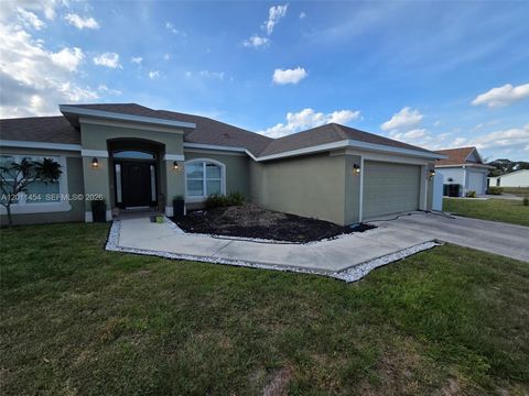 Photo of 1005 SW Bay State Rd, Port St Lucie, FL 34953 (MLS # A12011454)