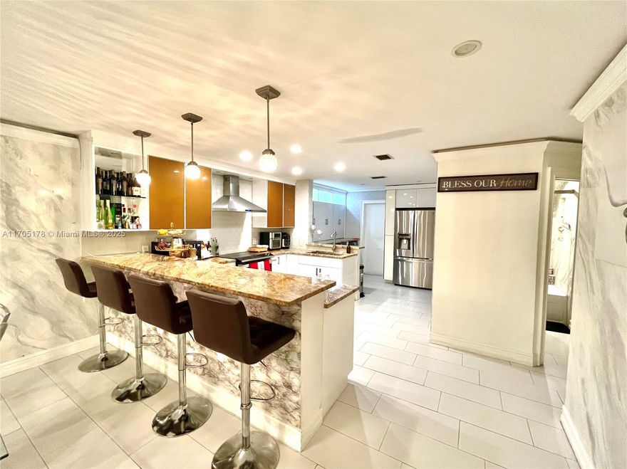 This beautifully renovated 3-bed 2-bath first-floor end unit blends modern elegance with comfort. Enjoy peace of mind with a new roof installed and accordion shutters. The sophisticated side entry adds charm and privacy. Relax on your private balcony with serene lake views. The spacious master suite features a luxurious en-suite bathroom with a walk-in shower and direct patio access. This home includes a 1-car garage and a driveway that fits two additional vehicles. The HOA covers water, cable TV, high-speed internet, building insurance, and full-time security. Residents enjoy top-notch amenities, including a gym, sports courts, three swimming pools, and a spa/jacuzzi.
Don’t miss this rare opportunity—schedule your showing today!