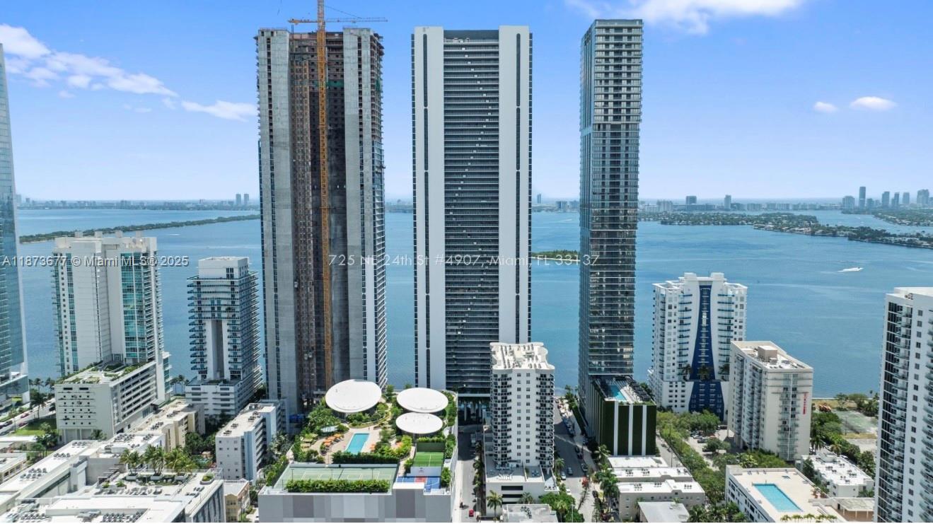 Welcome to luxury living in the sky! This brand-new corner unit on the 49th floor offers breathtaking panoramic views of Biscayne Bay, Miami Beach, and the Port of Miami. This spacious residence features 4 bedrooms, an office or nanny room, a den, and 5.5 bathrooms. Be the first to live in this stunning apartment. Floor-to-ceiling impact windows. Aria Reserve offers an unmatched collection of amenities, including a state-of-the-art fitness center, sauna and steam room, mini golf course, playground, three resort-style pools, a kids’ playroom, a teens’ lounge, as well as basketball and tennis courts. Don’t miss this opportunity to rent in one of Edgewater most exclusive new developments. Call today to schedule your private showing.