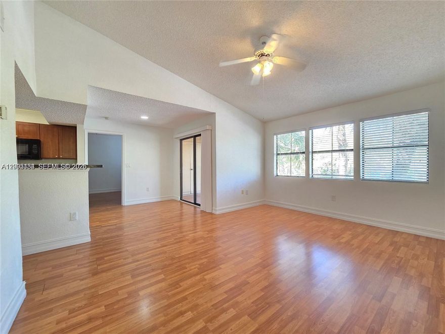 Spacious 2 Beds/2 baths split floor plan condo on the second floor. Features: Upgraded kitchen, stainless steel appliances, laminated wood flooring, upgraded bathrooms, screened balcony, full size Washer/Dryer. Lots of amenities, including 1 assigned parking and plenty of guest parking spaces, gated community, 24-hours security, oversize pool area, club house, gym & indoor racquetball courts.