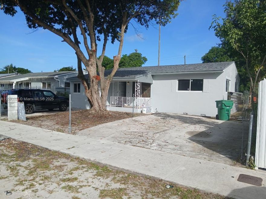 NEW ROOF, NEW IMPACT WINDOWS, NEW ELECTRIC, NEW KITCHEN CABINETS, NEW STAINLESS STEEL APPLAINCES, REMODELED BATH, NEW FLOORING, FRESHLY PAINTED. HUGE FENCED REAR YARD, MOVE IN READY.