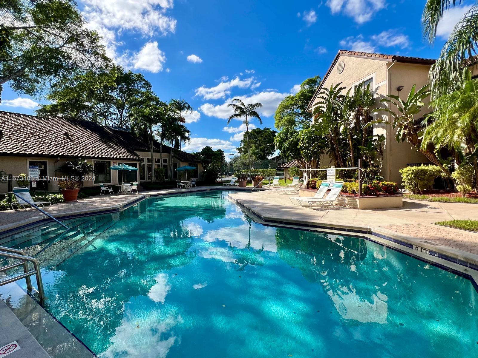Biggest 2/2 on the 1st Floor. Rent includes 1 COVERED GARAGE with control remote conveniently located in front of the unit plus an assigned parking space. Washer and dryer inside the unit. Centrally located in well-maintained Palm Aire community, between the Turnpike and I-95. Easy access to beaches, close to Shopping Center. Community has 2 swimming pools, 2 tennis courts and fitness center.