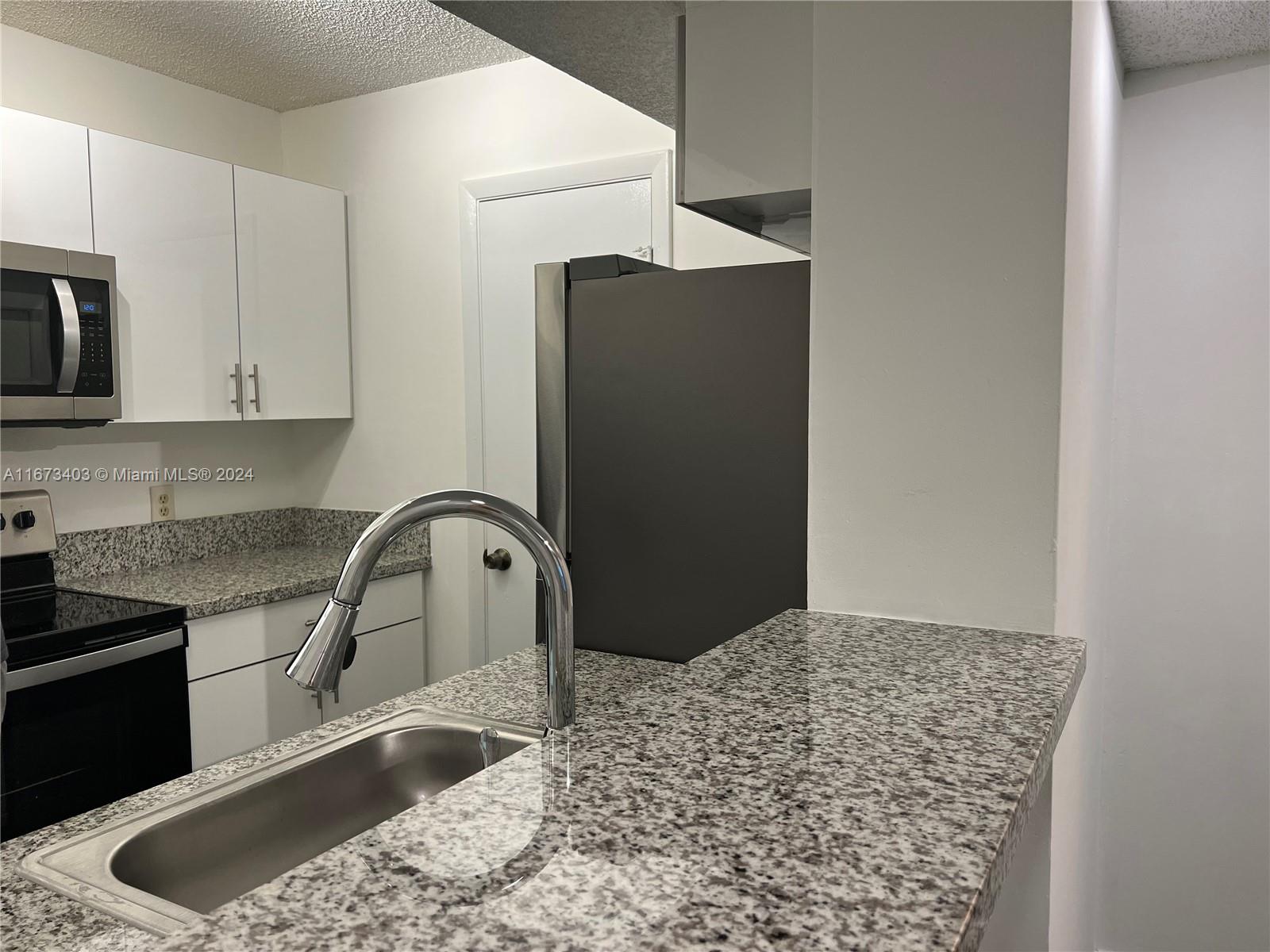 PALM AIRE GARDENS CONDO - Residential Lease