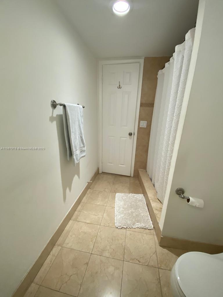 QUADOMAIN TOWER I AND IV - Residential Lease