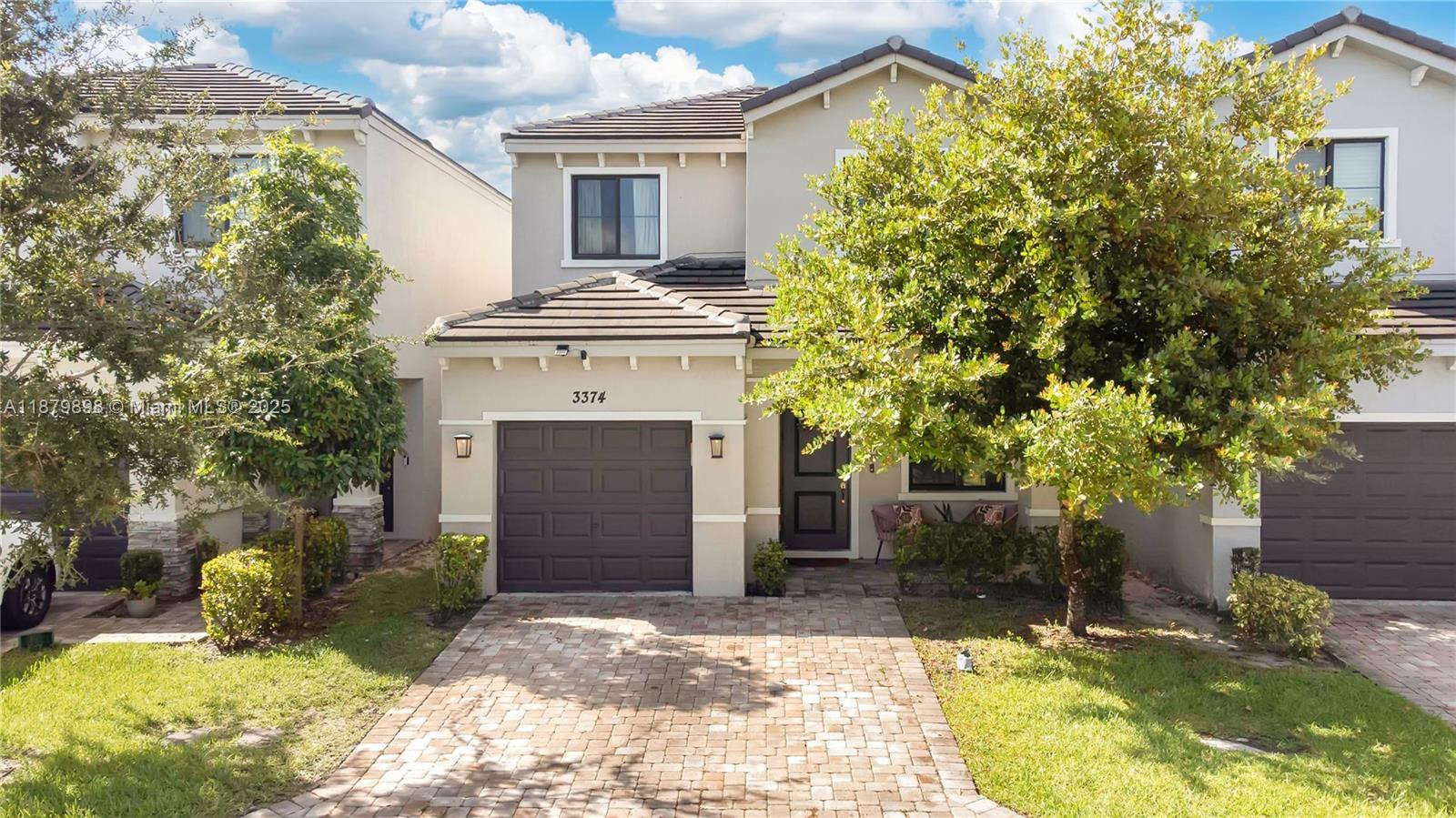 BUYER INCENTIVE! THIS HOME QUALIFIES FOR A $5,849 LENDER CREDIT TOWARD CLOSING COSTS WITH OUR PREFERRED LENDER. Welcome to your dream home in Pompano Beach! This 2-story residence blends modern elegance with comfort, featuring open-concept living, soaring ceilings, and bright windows. The first-floor primary suite offers a spacious bedroom, ample closet space, and spa-like bath with walk-in shower. The gourmet kitchen has granite countertops, stainless appliances, island, and pendant lighting for entertaining. Upstairs you’ll find more bedrooms, a loft-style family room, and upgraded baths. Enjoy Florida living with a deck, plus laundry, storage, and parking. Conveniently located near shopping, dining, and highways, this move-in ready home is waiting for you!