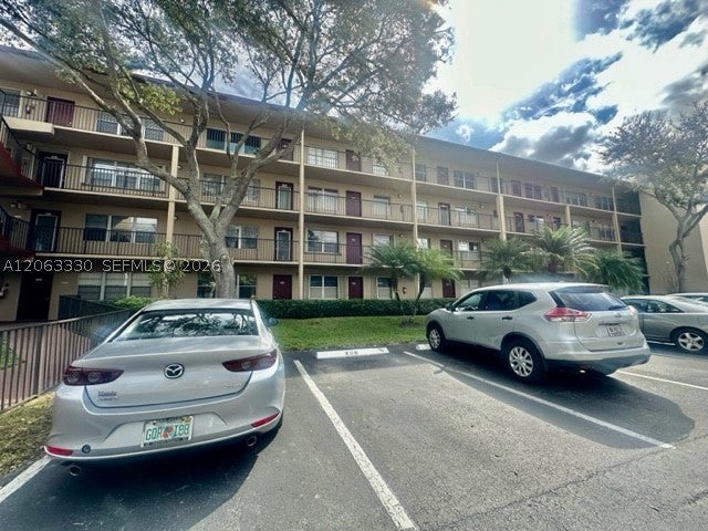 Photo of 801 SW 133rd Ter #105K, Pembroke Pines, FL 33027 (MLS # A12063330)