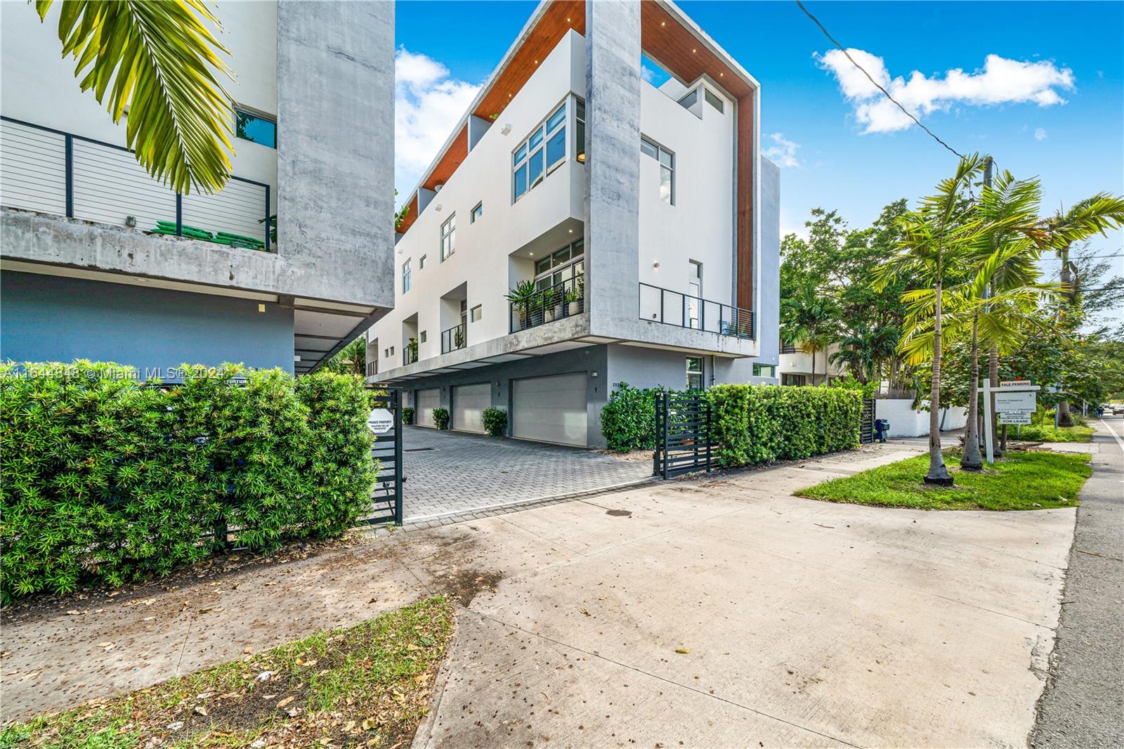 Look no more! Here is your modern, sophisticated town home in the heart of Coconut Grove! Corner unit, 1 of only 8 magnificent residences within a few minutes walk to Center Grove boasting magnificent dining experiences, parks and recreation centers! Wonderful natural light through all impact doors and windows. Spacious rooftop terrace - perfect for entertaining and just getting away for an evening drink! Top of the line appliances and wonderful finishes. 2 car garage and guest parking within this delightful, gated community.
