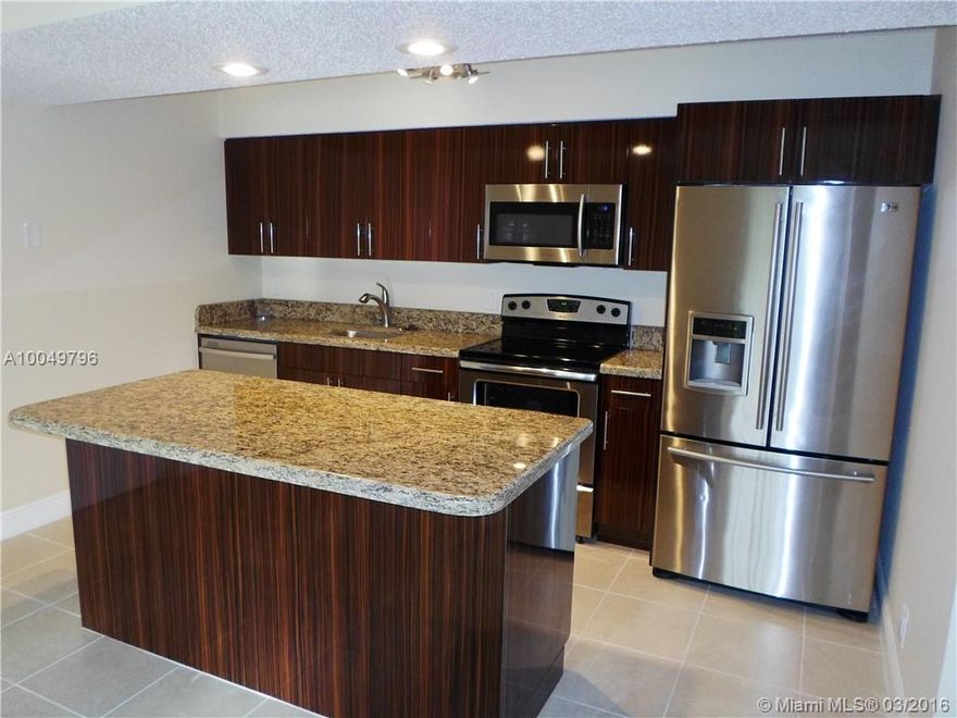 Gorgeous remodeled 1 bed 1 bath unit at Windward Lakes. Huge Modern kitchen with granite counter and island, new cabinets, and stainless steel appliances.  Tile and wood laminate floors. Updated bath with granite counter and new cabinets. Washer/Dryer inside the unit. Your client will fall in love with it. Show and rent today!