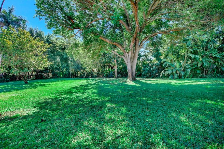 Discover this beautifully updated 3BD/2BA home in historic Plantation, nestled on a spacious lot with lush landscaping and curb appeal. Features include a bright, open living space with tile floors, a stunning brick fireplace, and a kitchen with brand-new stainless steel appliances, granite counters, and custom wood cabinetry. The expansive backyard provides the perfect outdoor retreat for children to play, and weekend gatherings with family and friends. An oversized carport accommodates multiple vehicles, complemented by a circular driveway for added ease. This upscale and peaceful location is ideal for families and professionals. Conveniently located near Broward Mall, top schools, and parks. Less than 20 minutes to downtown Ft Lauderdale and the beaches and 15 minutes to FLL Airport.