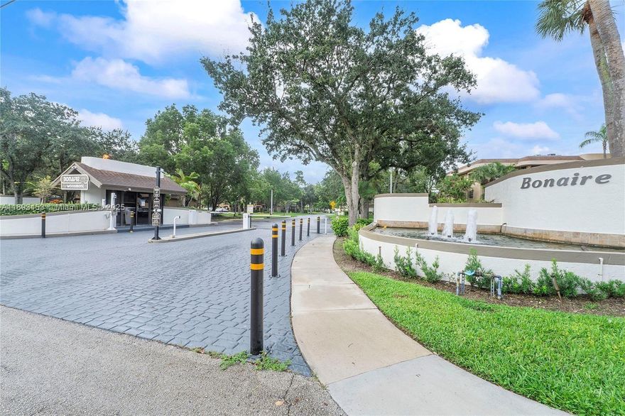 Welcome to this 2/2 condo located within a secure gated community. This stylish residence boasts vinyl wood flooring throughout the shared spaces, adding a touch of warmth & sophistication. The open floor plan connects the living room, dining area & kitchen, making it perfect for hosting guests or enjoying quiet evenings at home. Beautifully renovated 2nd bathroom. Master bedroom has 2 walk in closets. You'll appreciate the convenience of an in-unit laundry & plenty of storage options. Step out onto your private screened balcony w/ pool view, for savoring your morning coffee or unwinding in the evening  With community features like a swimming pool, hot tub, BBQ area and clubhouse, this condo blends comfort & lifestyle. Seize the opportunity to make this exceptional residence your own!