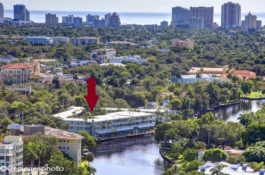 Outstanding price for Las Olas.  Florida condo home in highly desired small boutique building on the New River & one block to Las Olas Boulevard. Premier location. Steps to river. Neutral light tile throughout living area and wood like laminate in bedroom.  All impact windows & doors.  Timeless kitchen provides large island for entertaining.  Tranquil, private and  beautiful pool and garden views. Located in the heart of downtown for Lauderdale steps to business district & Las Olas restaurants, shopping & entertainment district. On the New River. Watch the yachts cascade by. Downtown, close to FTL Beach, airport & port. Next to water taxi stop. On Fort Lauderale Boat parade route.