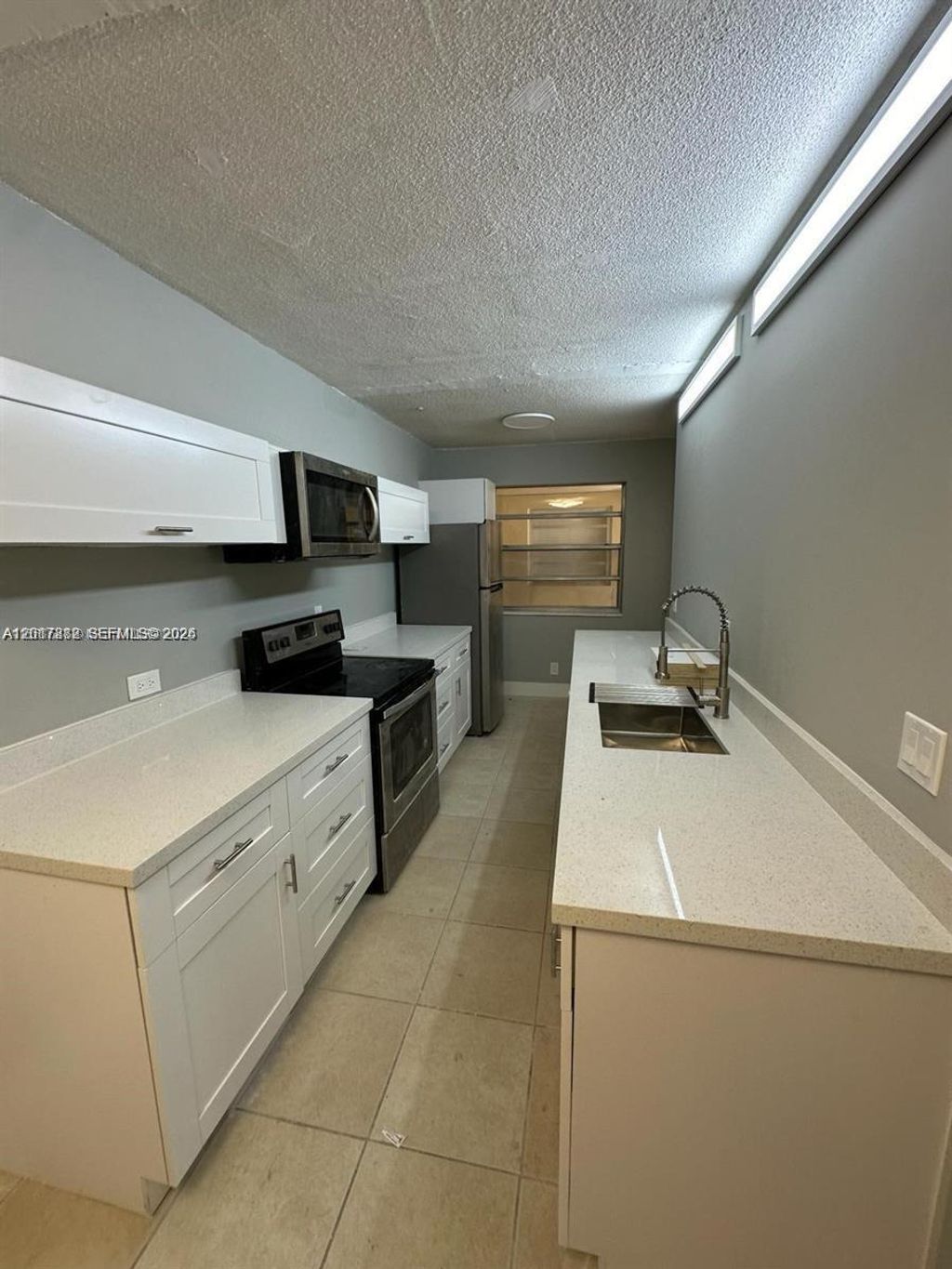 Photo of 1100 NE 1st Ct #201, Hallandale Beach, FL 33009 (MLS # A12017882)