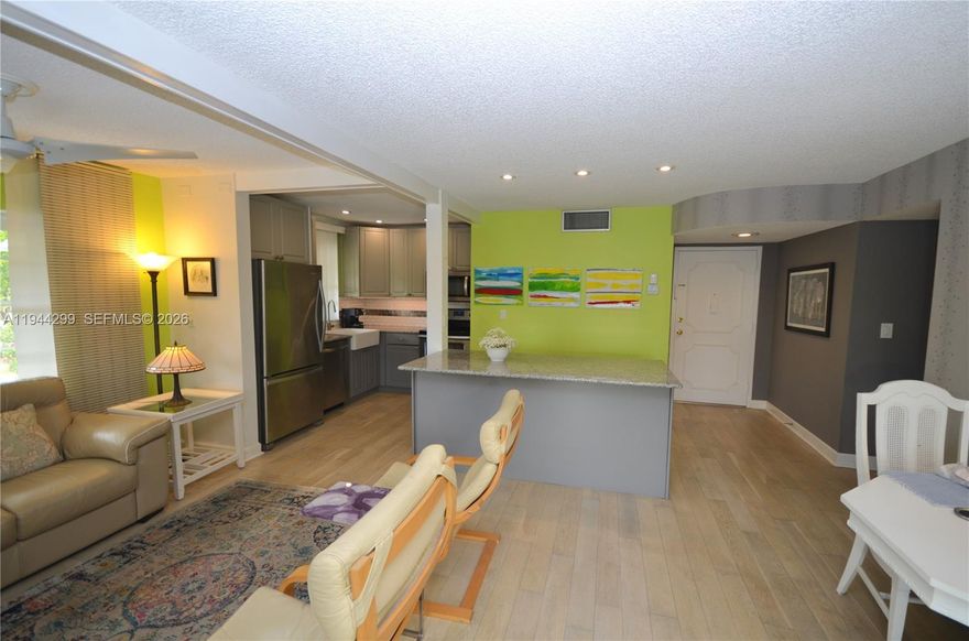 If you are looking for a wonderful corner unit , nicely furnished at a reasonable price, your search is over.Bright and sunny space with open kitchen leading into living area and screened balcony.Well appointed kitchen with granite countertops.Large screened balcony is a great addition to your living space.Well located community with many amenities including large pool, tennis,exercise room,sauna,shuffleboard,BBQ area, kitchen for parties and clubhouse.Secured storage room.Laundry on the same floor.Active 55+ community.Perfect for a seasonal retreat or full time residence.Move in ready.