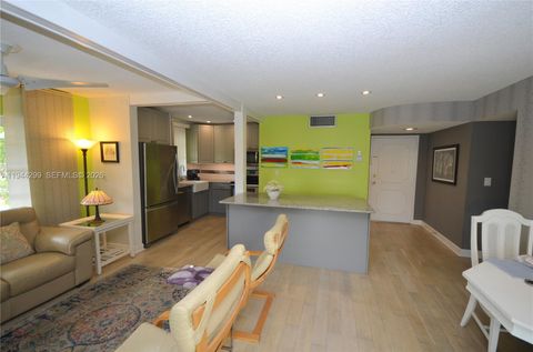 Photo of 5180 E Sabal Palm Blvd #340, Tamarac, FL 33319 (MLS # A11944299)