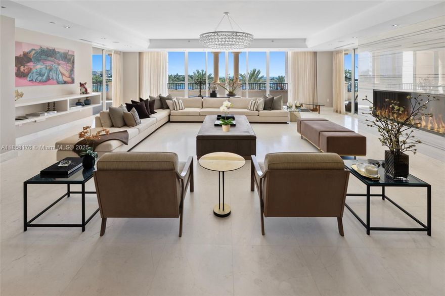 Just steps from the Atlantic and Miami’s vibrancy, Fisher Island offers a lifestyle of wellness and luxury. Commanding the prized center stack of a distinguished address, this 7,025 SF 6BR residence captures sweeping views of South Beach, Government Cut, and the ocean. Expansive living spaces flow effortlessly, featuring a grand master suite with private office and serene water vistas, a cozy family room, and a sprawling terrace ideal for alfresco dining and sunset watching, plus a private garage and ample storage. The building is being modernized w/ an aperitivo lounge, elegant new lobby, and reimagined pool area, elevating world-class island living.