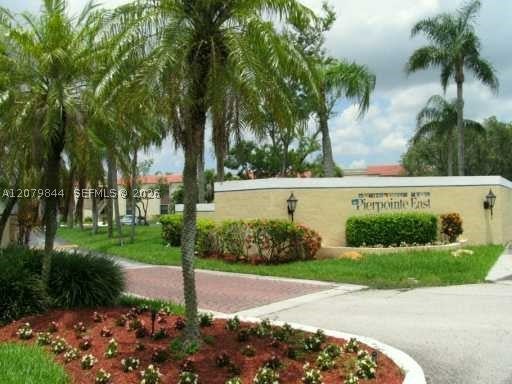 Photo of 1060 N Hiatus Rd #1060, Pembroke Pines, FL 33026 (MLS # A12079844)