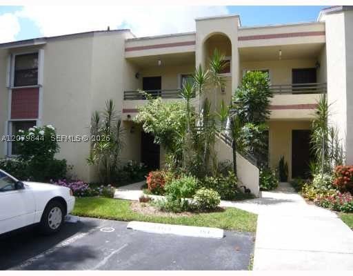 Photo of 1060 N Hiatus Rd #1060, Pembroke Pines, FL 33026 (MLS # A12079844)
