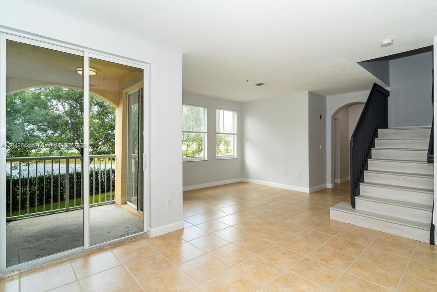 NEWLY REMODELED 2-STORY TOWNHOUSE CONDO IN GATED COMMUNITY.  THIS MODERN HOME FEATURES A LARGE KITCHEN W/ NEW STAINLESS APPLIANCES, GRANITE COUNTERS AND WHITE CABINETS * BRAND NEW BATHROOMS W/ MODERN VANITIES AND PORCELAIN TILE FLOORING AND SHOWERS * NEW LUXURY VINYL PLANK FLOORING ON STAIRS AND ENTIRE 2ND FLOOR * PRIVATE BALCONY OVERLOOKS A BEAUTIFUL LAKE.  COMMUNITY POOL, PLAYGROUND, GYM. CLOSE TO I-75, SHOPPING, RESTAURANTS, PEMBROKE GARDENS AND CITY PARKS.